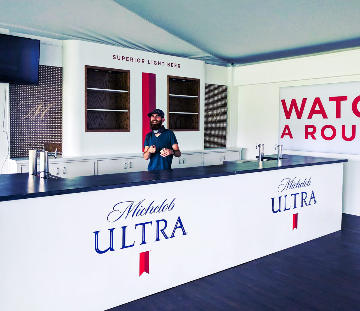 Adhere Studio environmental branding install — Michelob Ultra hospitality bar